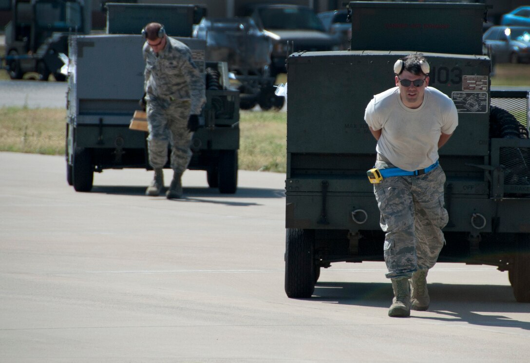 Airmen from Altus Air Force Base, Okla., pitched in to help load and inspect equipment and tools onto a C-130 Hercules supplied by Dyess AFB, Texas, May 11, 2014. Through the help of Dyess and Atlus, members of Sheppard’s own 88th Fighter Training Squadron were able to make the trip down to Florida to provide air-to-air combat simulation presentations for the Florida Air National Guard. The trip provides training to both the FANG and the instructor pilots from Sheppard AFB, Texas. (U.S. Air Force photo/Airman 1st Class Robert L. McIlrath)





 

