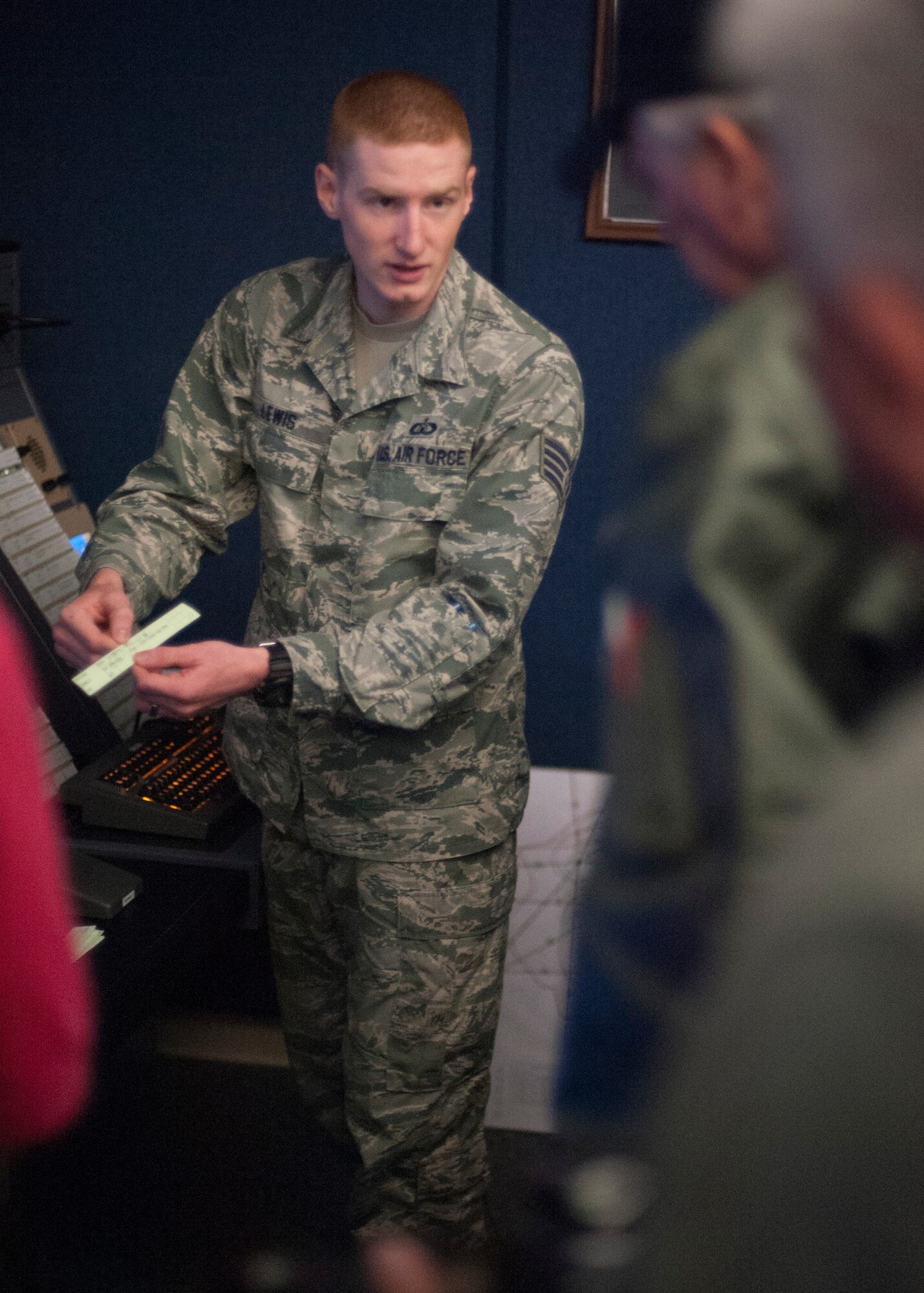 Staff Sgt. Justin Lewis, 436th Operations Support Squadron air traffic control radar approach controller, talks to civilian pilots during the Dover Air Force Base Mid-Air Collision Avoidance Fly-in May 17, 2014, at Dover AFB, Del. The civilian pilots are encouraged to contact the DAFB tower when they fly near the base’s airspace. (U.S. Air Force photo/Senior Airman Jared Duhon) 
