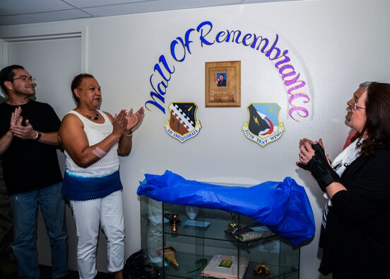 Special Emphasis Program managers unveiled the “Wall of Remembrance” displayed in honor of the former Hispanic Employment Program manager, Johnny Anthony, who passed away last November. The wall was introduced May 16 in Bldg. 3760. (U.S. Air Force photo by Rebecca Amber)