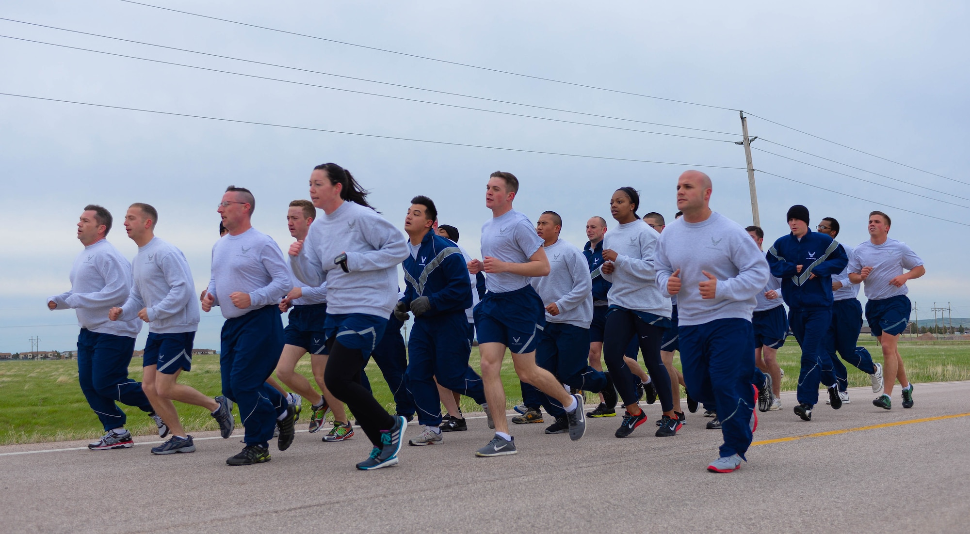Airmen assigned to the 28th Security Forces Squadron participate in a Police Week 5k run at Ellsworth Air Force Base, S.D., May 12, 2014. Members ran to show support for fallen officers who sacrificed their lives to protect the freedoms of others. (U.S. Air Force photo by Senior Airman Zachary Hada/Released)