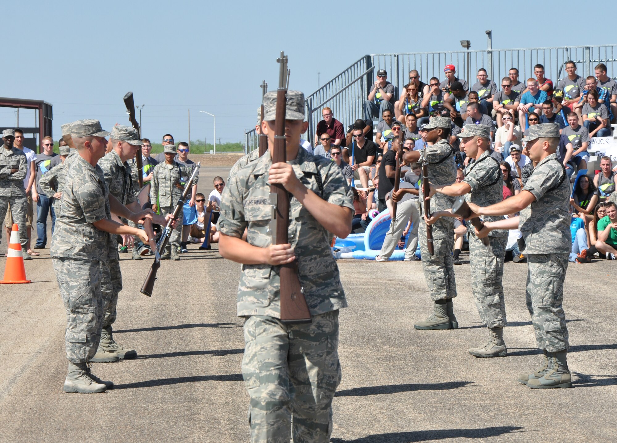 GOODFELLOW AIR FORCE BASE, Texas – The 312th Training Squadron performs during the exhibition drill portion of the 17th Training Group’s second quarter drill competition on the flight line here May 10. Out of the four areas competed in, the 312th won the open ranks and individual drill competitions. (U.S. Air Force photo/ Senior Airman Joshua Edwards)