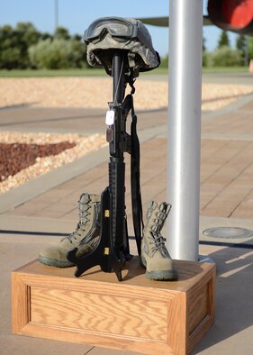 A battlefield cross is displayed during a National Police Week memorial ceremony at Beale Air Force Base, Calif., May 15, 2014. In 1962, President John F. Kennedy proclaimed the calendar week of May 15 as National Police Week. (U.S. Air Force photo by John Schwab/Released)  