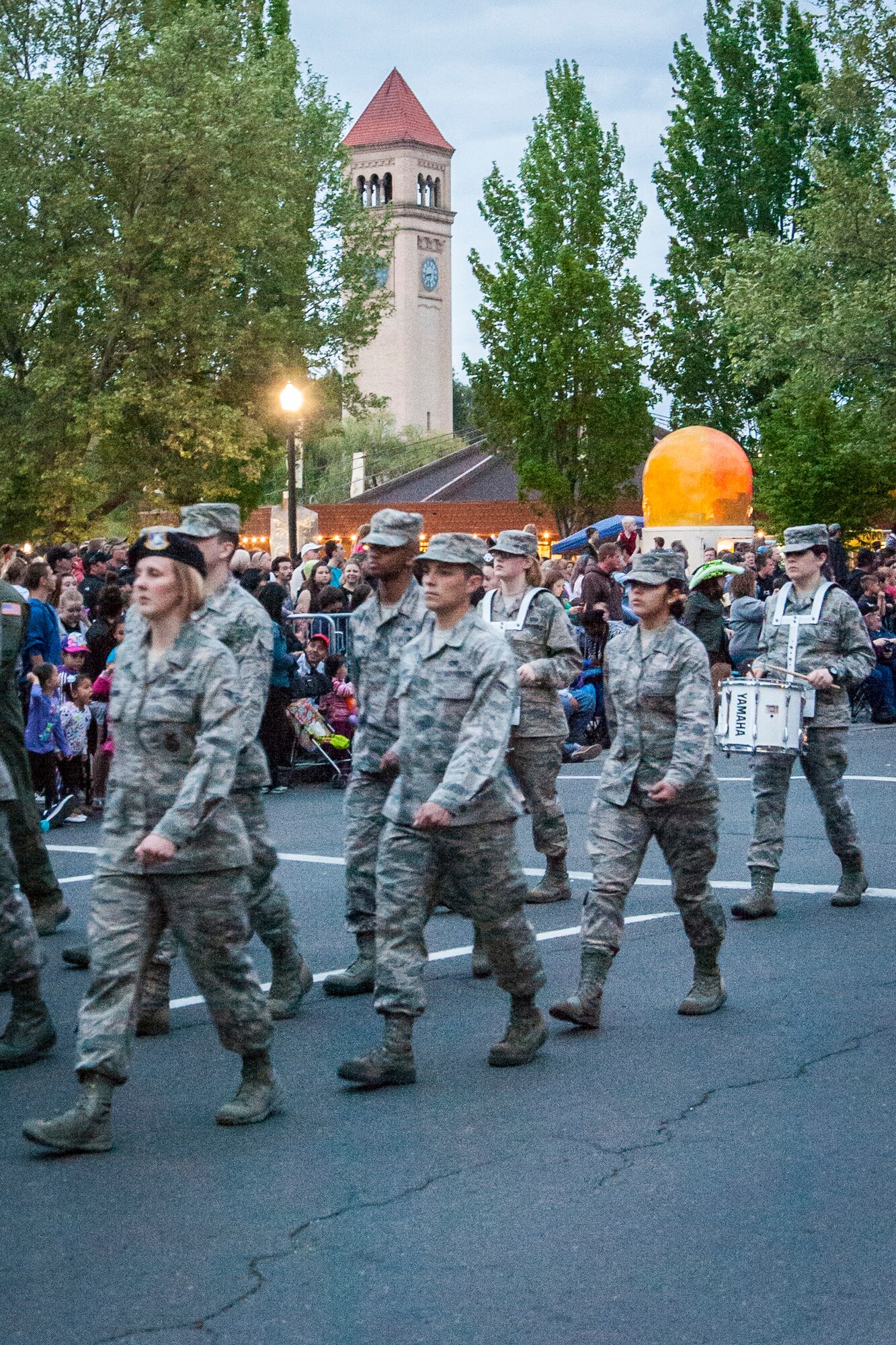 Airmen from Fairchild Air Force Base, Wash., march in formation during the 75th Annual Lilac Festival Armed Forced Torchlight Parade in Spokane, Wash., May 17, 2014. The parade is the largest armed forces torchlight parade in the nation and is made to honor service members of both the past and present. (U.S. Air Force photo by Staff Sgt. Benjamin W. Stratton/Released)