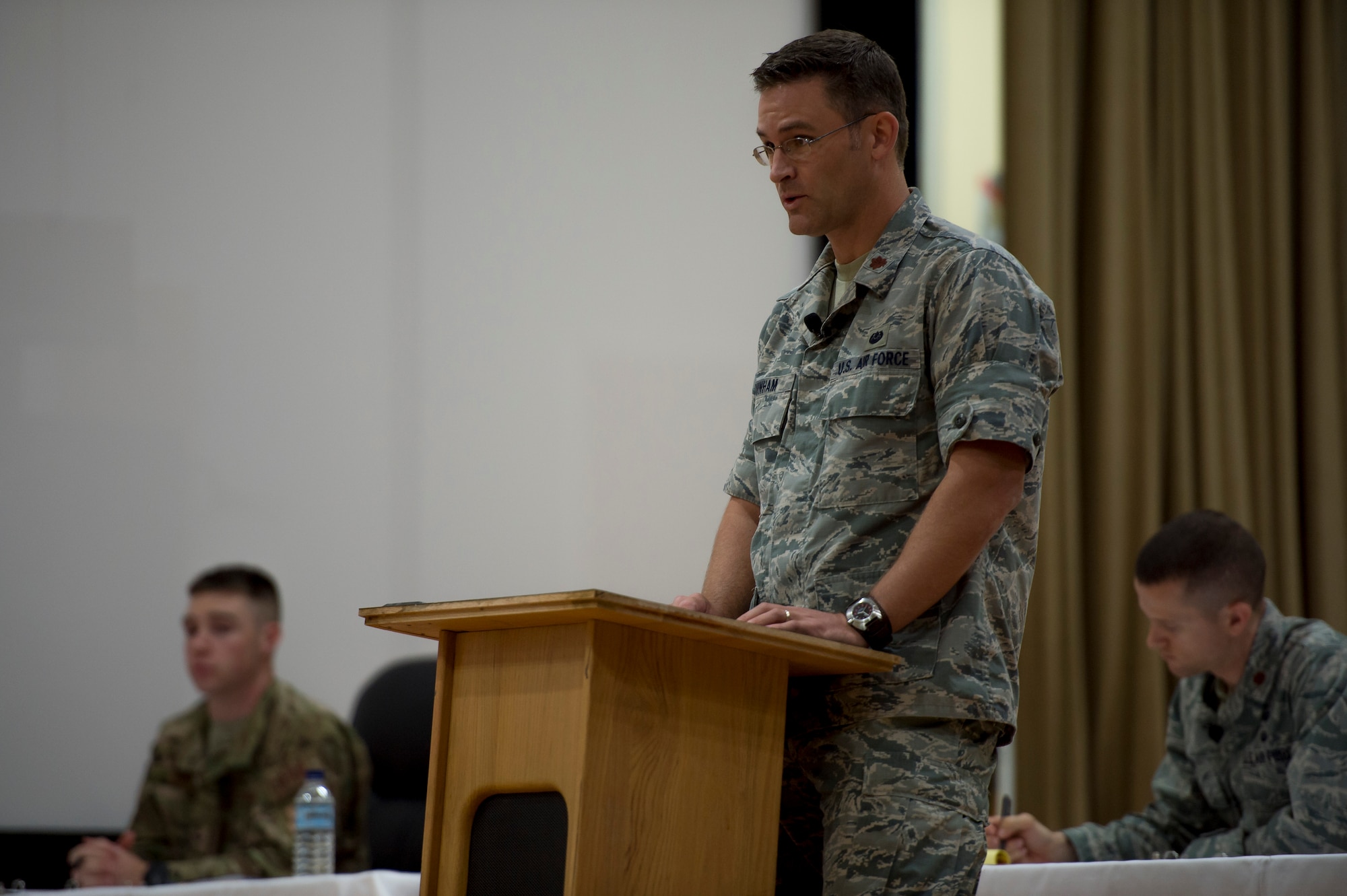 U.S. Air Force Maj. Matthew Dunham, U.S. Embassy Office of Military Cooperation staff judge advocate, interrogates a witness at the Rock Theater May 14, 2014 at an undisclosed location in Southwest Asia. The mock jury trial was held to educate attendees about the military justice system and the adverse effects of sexual assault. (U.S. Air Force photo by Staff Sgt. Jeremy Bowcock)