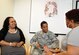 (Left to right) Renetta Cowan, Senior Master Sgt. Demetrica Jefferis and Lisa Harrison discuss their plans for a Breast Cancer Support Group at the Malcolm Grow Medical Clinics and Surgery Center on Joint Base Andrews, Md., May 12, 2014. Ladies will host the first group meeting in the 4th floor conference room at MGMCSC May 21 from 10-11 a.m. Jefferis, a breast cancer survivor, is the Air Force Element superintendent. Cowan and Harrison are both 779th Medical Group social workers. (U.S. Air Force photo/Master Sgt. Tammie Moore)