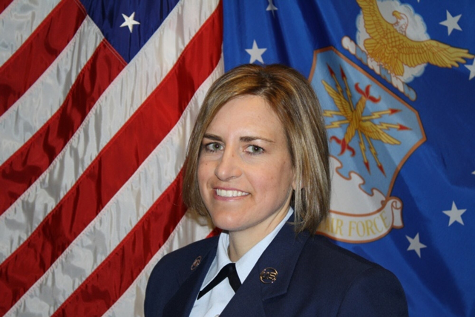 Senior Airman Mindy Bent, 302d Aeromedical Staging Squadron, earned the Commandant's Award for Class 14-5. The Commandant Award recognizes the student who best displays professional military leadership qualities and makes the most significant contribution to the overall success of the class. (U.S. Air Force courtesy photo)