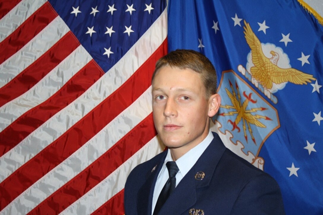Senior Airman Calder Austin, 80th Operations Support Squadron, earned the Academic Achievement Award for Class 14-5. This award denotes excellence as a scholar and is earned by the student with the top academic scores in the class. (U.S. Air Force courtesy photo)