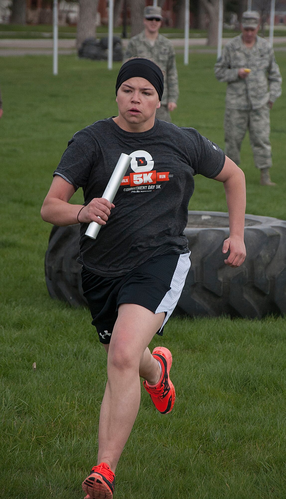 140516-F-GZ967-032 Senior Airman Monica West, 90th Comptroller Squadron, sprints 50 meters during the team torture event May 16. Each member of the team had to run the 50-meter sprint as the final obstacle to finish the relay. (U.S. Air Force photo by Airman 1st Class Brandon Valle)