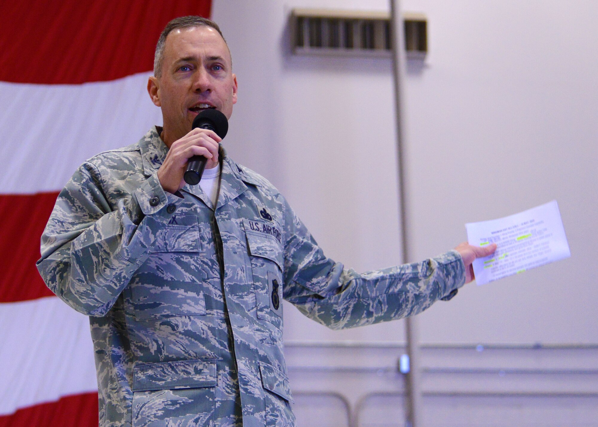 Col. Tom Wilcox, 341st Missile Wing commander, speaks to Team Malmstrom members during a base-wide all call at the 3-Bay Hangar on May 16. Wilcox discussed the importance of safety and risk management, sexual assault prevention and the critical days of summer. (U.S. Air Force photo/Senior Airman Katrina Heikkinen)