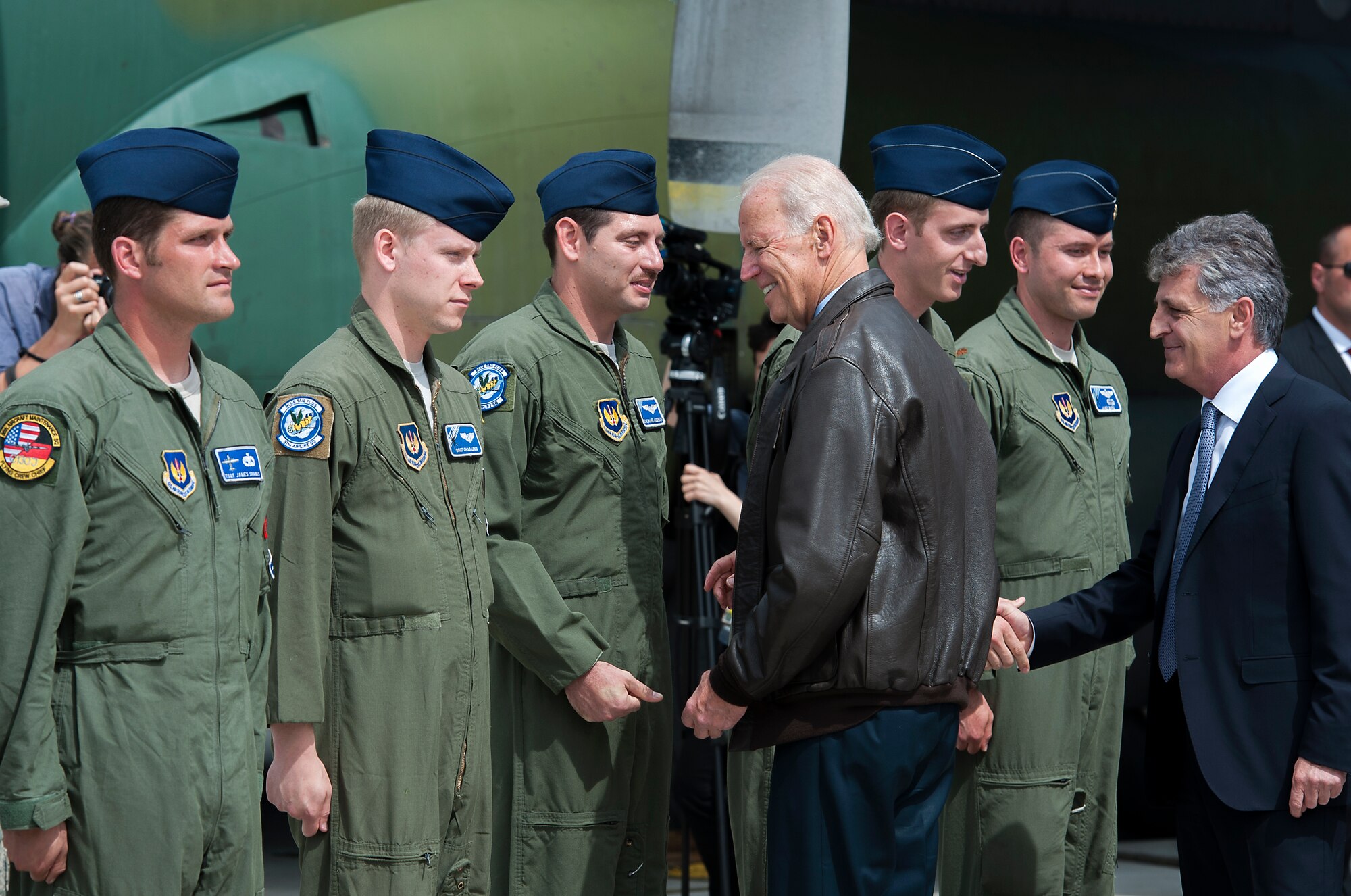 U.S. Vice President Joe Biden meets members of the 37th Airlift Squadron and 86th Aircraft Maintenance Squadron at Bucharest, Romania, May 20, 2014. Members of team Ramstein visited Romania to take part in Carpathian Spring 2014, a two week-long training exercise which helps both countries maintain training proficiencies and build partnerships. (U.S. Air Force photo/Senior Airman Damon Kasberg)
