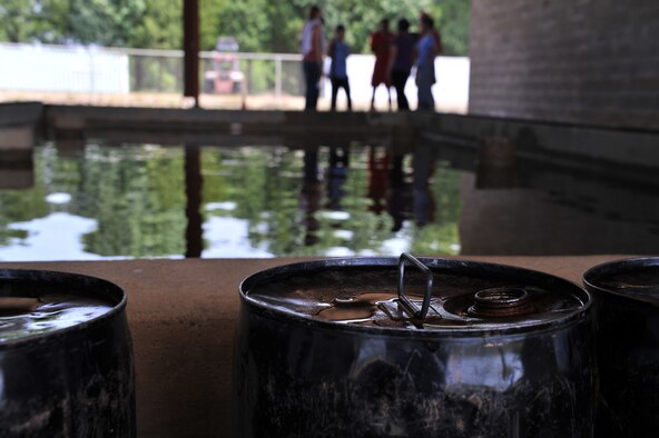 Key spouses from the 42nd Air Base Wing discuss what they learned from a Project X Leadership Reaction Course task, May 19, 2014, here. Officers attending Air University schools go through the course to learn strengths and weaknesses, as well as unique problem solving approaches to apply to their careers. The spouses went through the course to gain the same understanding in addition to strengthening bonds between one another. (U.S. Air Force photo by Staff Sgt. Natasha Stannard)