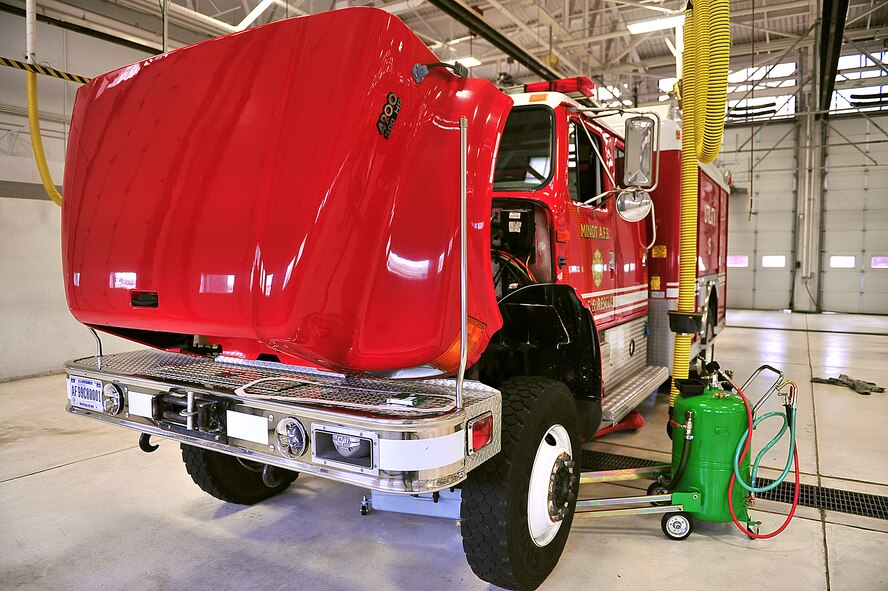 A P-30 utility truck from the 5th Civil Engineer Fire Station gets worked on by the 5th Logistics Readiness Squadron Fire Truck Maintenance Team at Minot Air Force Base, N.D., May 13. The fire truck maintenance team performs scheduled, unscheduled and preventative maintenance on the 5th Bomb Wing fire, crash and structural response trucks and equipment fleet. (U.S. Air Force photo/Senior Airman Kristoffer Kaubisch)