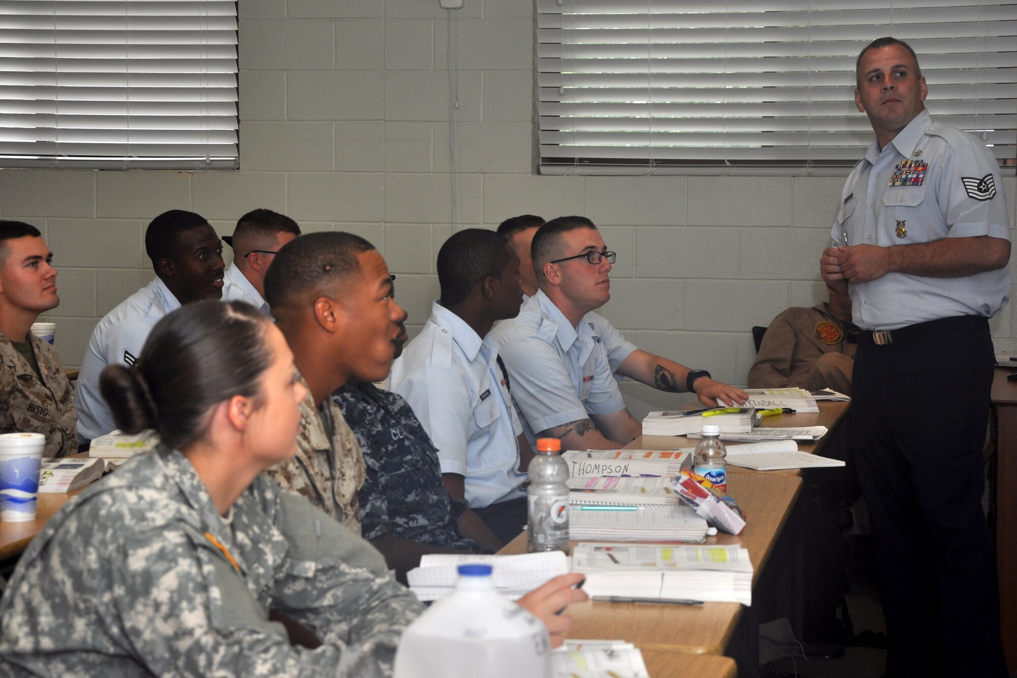 GOODFELLOW AIR FORCE BASE, Texas -- Tech. Sgt. John J. Deese, 312th Training Squadron instructor supervisor, educates students in class at the Louis F. Garland Department of Defense Fire Academy May 19. Deese received the 2013 DOD Fire Service Instructor of the Year Award March 7. (U.S. Air Force photo/ Airman 1st Class Breonna Veal)