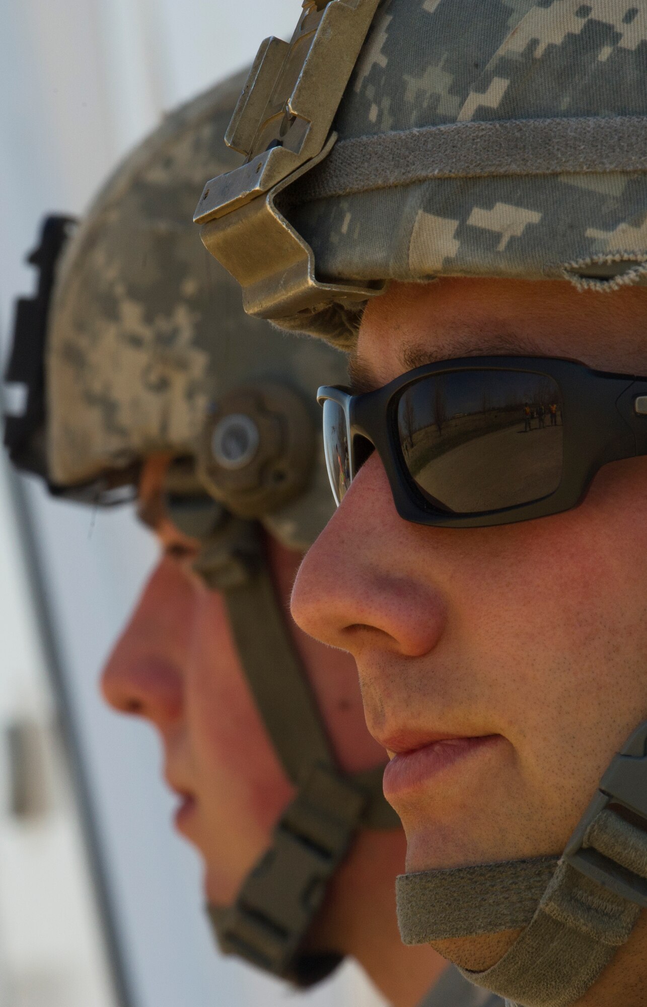 Defenders from the791st Missile Security Forces Squadron guard a payload transporter during an exercise at Minot Air Force Base, N.D., May 15, 2014. Recapture and recovery exercises provide defenders an opportunity to train for certain scenarios.  (U.S. Air Force photo/Senior Airman Brittany Y. Auld)