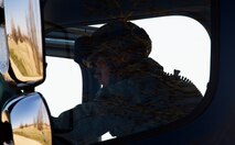 Senior Airman Franklin Sloat, 791st Missile Security Forces Squadron response force leader, examines the inside of a payload transporter during an exercise at Minot Air Force Base, N.D., May 15, 2014. Recapture and recovery exercises provide defenders an opportunity to train for certain scenarios. (U.S. Air Force photo/Senior Airman Brittany Y. Auld)