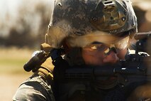 Staff Sgt. Devin McMiller, 91st Security Support Squadron tactical response force member, provides cover during a recapture, recovery exercise at Minot Air Force Base, N.D., May 15, 2014. The purpose of this training is to maintain readiness for launch facility recapture. (U.S. Air Force photo/Senior Airman Brittany Y. Auld)