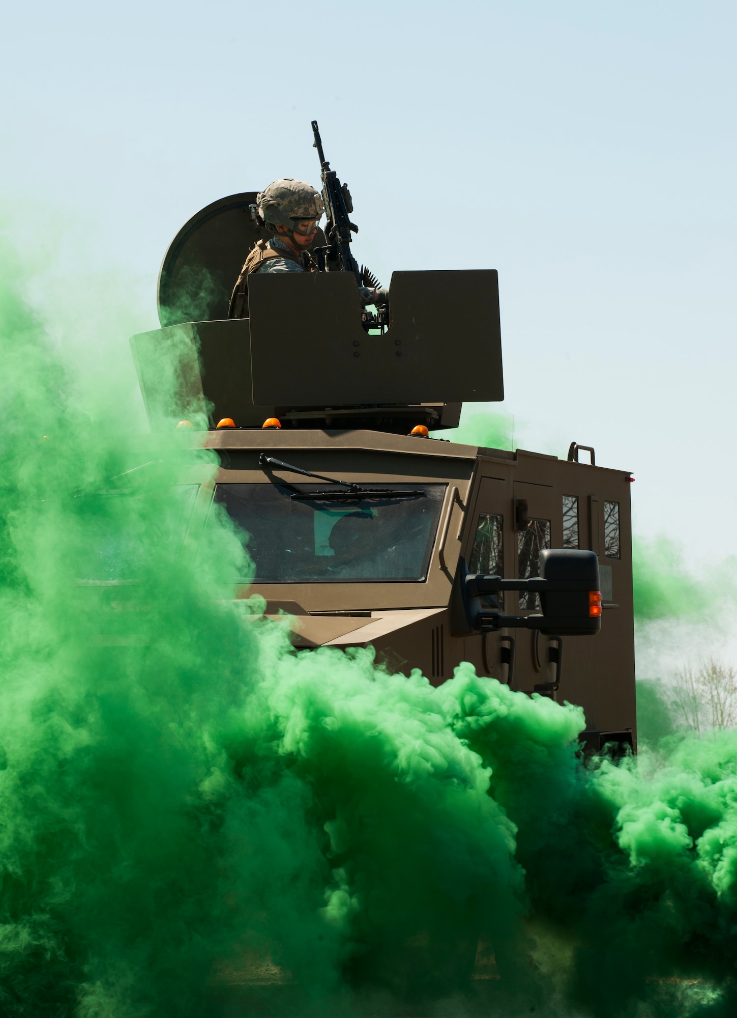 A convoy response team member from the 791st Missile Security Forces Squadron mans the turret of a bearcat at Minot Air Force Base, N.D., May 15, 2014. Members of the 791st MSFS and 91st Security Support Squadron tactical response force participated in a recapture and recovery exercise. (U.S. Air Force photo/Airman 1st Class Apryl Hall)