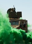 A convoy response team member from the 791st Missile Security Forces Squadron mans the turret of a bearcat at Minot Air Force Base, N.D., May 15, 2014. Members of the 791st MSFS and 91st Security Support Squadron tactical response force participated in a recapture and recovery exercise. (U.S. Air Force photo/Airman 1st Class Apryl Hall)