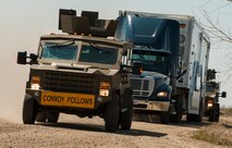 A convoy response force team from the 791st Missile Security Forces Squadron approaches during an exercise at Minot Air Force Base, N.D., May 15, 2014. Members of the 791st MSFS and 91st Security Support Squadron tactical response force participated in a recapture and recovery exercise as part of training. (U.S. Air Force photo/Airman 1st Class Apryl Hall)