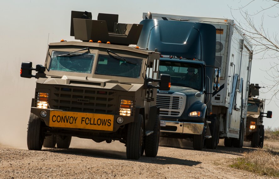 A convoy response force team from the 791st Missile Security Forces Squadron approaches during an exercise at Minot Air Force Base, N.D., May 15, 2014. Members of the 791st MSFS and 91st Security Support Squadron tactical response force participated in a recapture and recovery exercise as part of training. (U.S. Air Force photo/Airman 1st Class Apryl Hall)