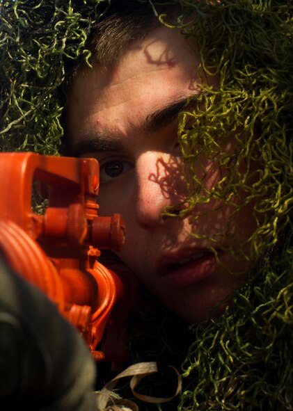 An Airman from the 791st Missile Security Forces Squadron acts as an opposing force during a recapture and recovery exercise at Minot Air Force Base, N.D., May 15, 2014. The purpose of this training is to maintain readiness for launch facility recapture. (U.S. Air Force photo/Senior Airman Brittany Y. Auld)