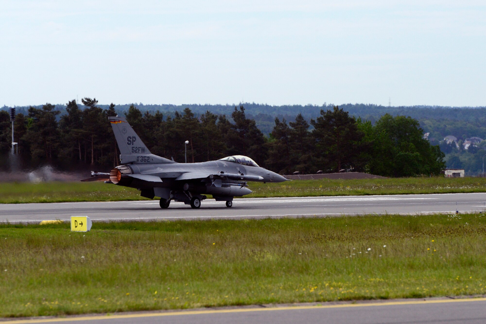 U.S. Air Force Col. David Julazadeh, 52nd Fighter Wing commander, pilots a U.S. Air Force F-16 Fighting Falcon fighter aircraft during take-off for his final flight as a saber, May, 20, 2014, at Spangdahlem Air Base, Germany. This flight is an Air Force tradition commemorating the departure of a commander or accompanying a milestone in the career of an entire aircrew. (U.S. Air Force photo by Staff Sgt. Christopher Ruano/Released)