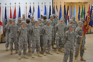 Soldiers assigned to the 492nd Transportation Detachment (Harbormaster), 10th Transportation Battalion, 7th Transportation Brigade (Expeditionary), stand in formation during a deployment ceremony at Fort Eustis, Va., May 16, 2014. The unit is deploying in support of Operation Enduring Freedom. (U.S. Army photo by Spc. Marian Alleva/Released)