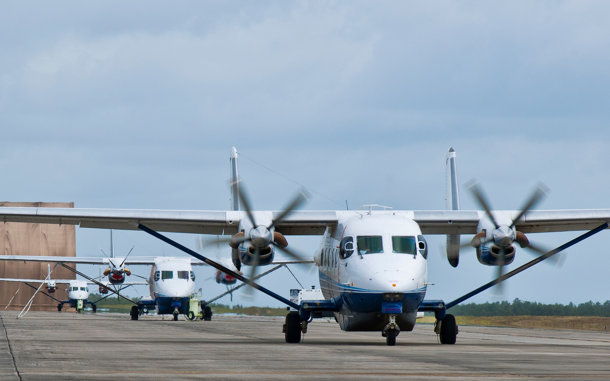 Propellers begin to spin on the C-145 Skytruck prior to a sortie at Duke Field, Fla.  The Aviation Foreign Internal Defense and Skytruck mission is a joint active-duty and reserve Air Force Special Operations Command mission.  (U.S. Air Force photo/Tech. Sgt. Samuel King Jr.)
