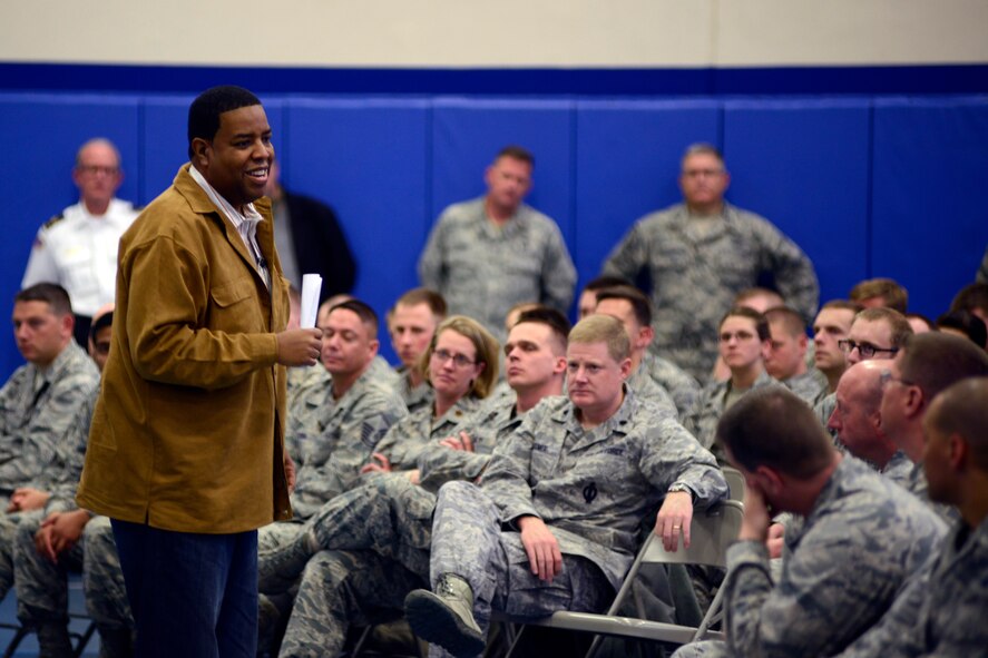 Chip Simmons, Denver Broncos chaplain, talks about how to overcome and successfully navigate through the “hits” in life during his talk on “65 Toss Power Trap” presentation May 13, 2014, at Schriever Air Force Base, Colo. The event was part of the Schriever Wingman and Sexual Assault Prevention and Response Down Week. (U.S. Air Force photo/Christopher DeWitt)