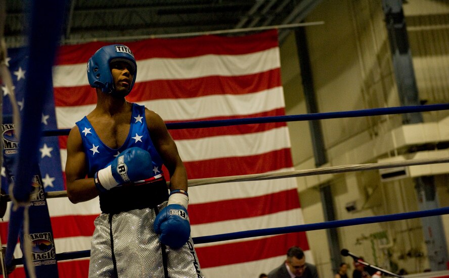 Senior Airman Tavarus Roberts, 791st Missile Security Forces Squadron fire team leader, prepares for his boxing match at Grand Forks Air Force Base, N.D., April 12, 2014. Roberts is a native of Fort Worth, Texas. (U.S. Air Force photo/Senior Airman Malia Jenkins)