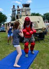 Ashley Barlotta, 18, engages in a self-defense demonstration during Duke Field’s Family Day event May 3.  The 919th Special Operations Wing sets aside a special day each year to show appreciation for its reservists and their family members. Events included music, sports, children’s games, etc. (U.S. Air Force photo/Tech. Sgt. Jasmin Taylor)