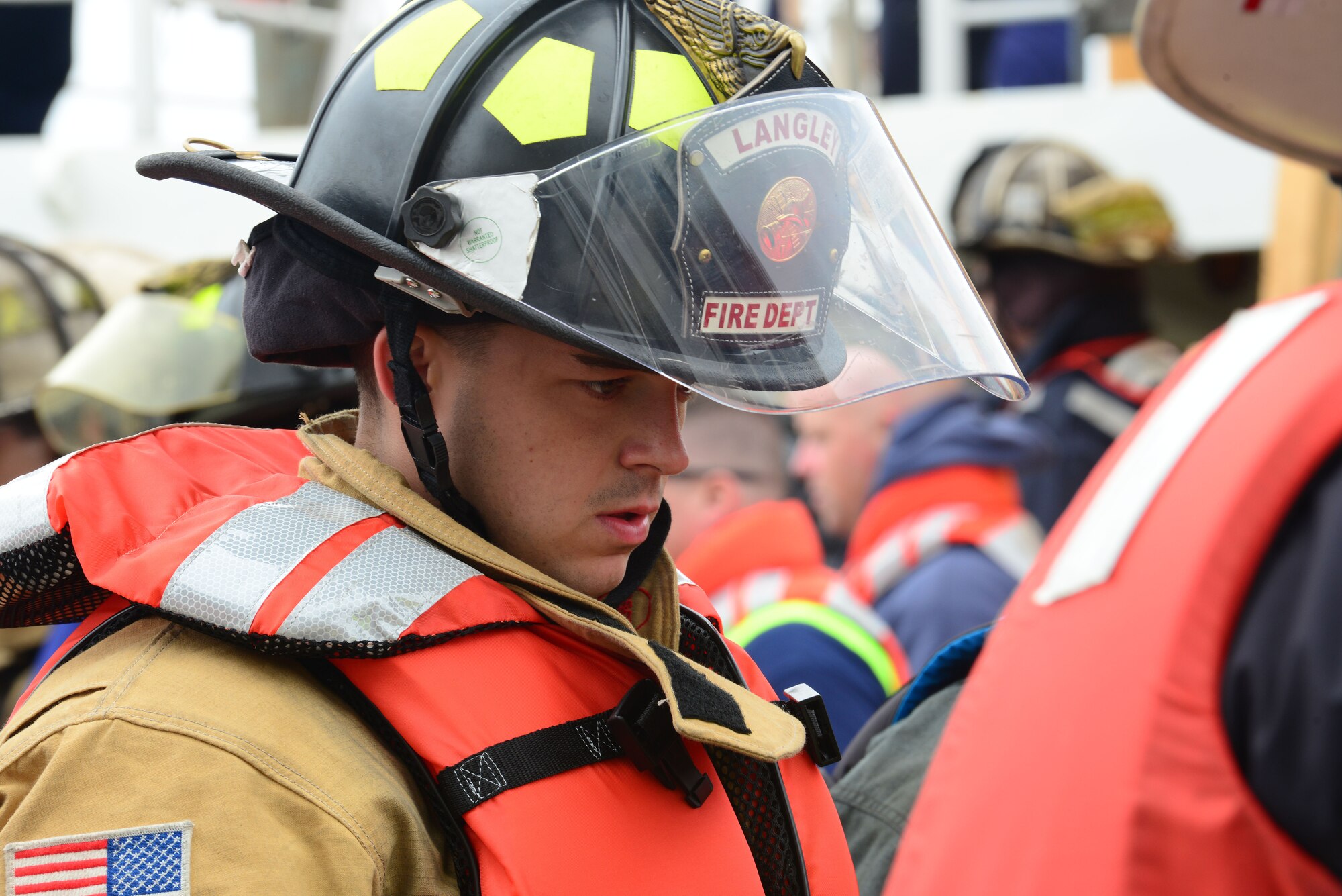 U.S. Air Force Staff Sgt. Chad Green, 633rd Civil Engineer Squadron crew chief, participated in the 23rd Annual Hampton Roads Marine Firefighter School at Fort Eustis, Va., May 16, 2014. Green was one of 113 students who took part in the school, which included learning how to de-water a ship and control an engine fire. (U.S. Air Force photo by Airman 1st Class Kimberly Nagle/Released)