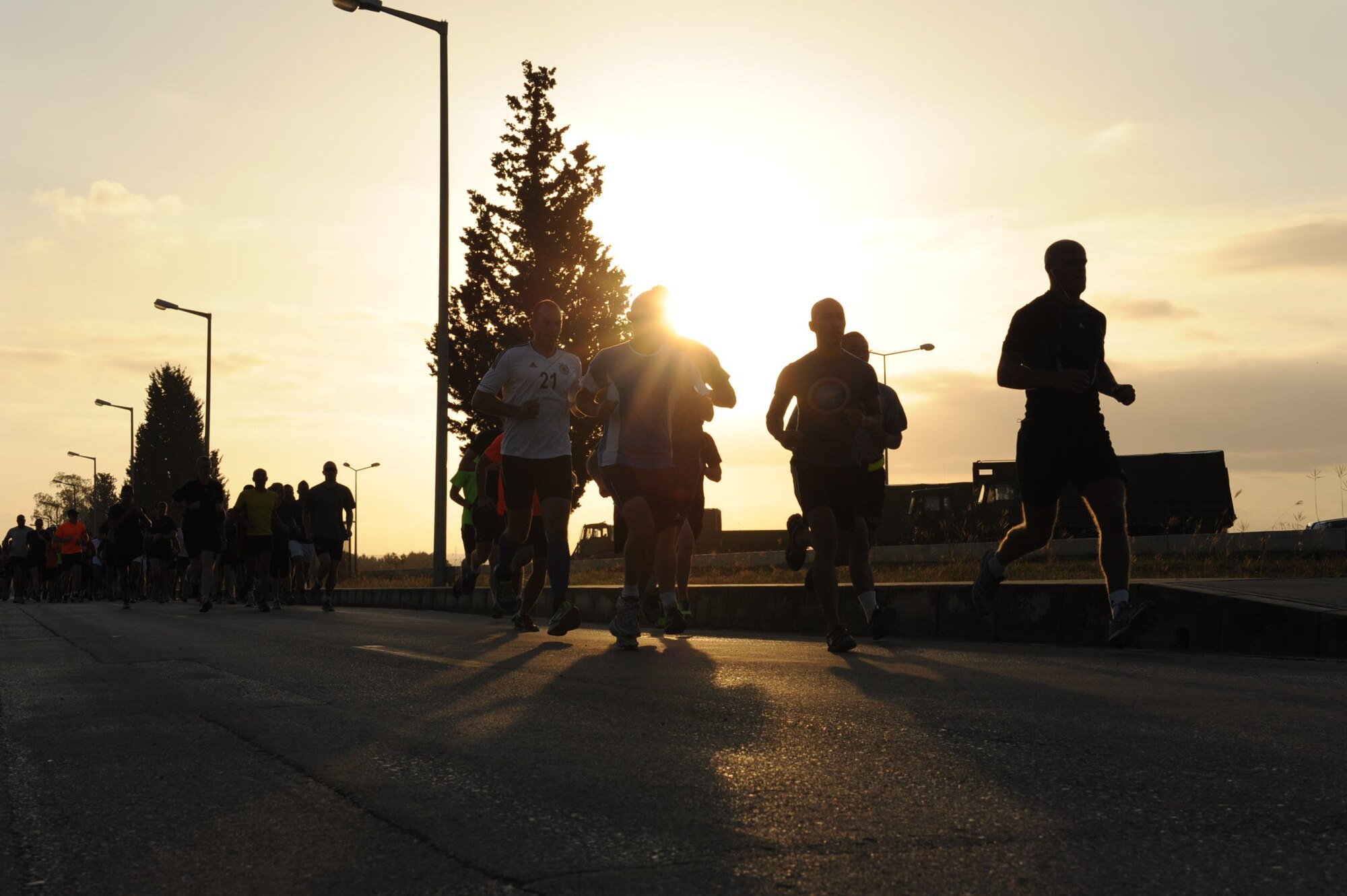More than 120 participants start the quarterly Dutch Sports Organization Half Marathon May 18, 2014, Incirlik Air Base, Turkey.  Capt. Tommy Rutherford, 728th Air Mobility Squadron aerial port flight commander, won the men’s category, Casey Triplett, wife of Lt. Col. Henry Triplett, 728th Air Mobilty Squadron commander, won the women’s category. (U.S. Air Force photo by Staff Sgt. Eboni Reams/Released)