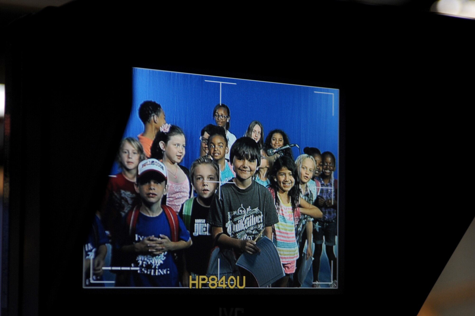 Incirlik Unit School students tour American Forces Network-Incirlik during Job Shadow Day May 16, 2014, Incirlik Air Base, Turkey. Shadow Day is held annually to allow prekindergarten through 12th grade students an opportunity to spend the day with someone who works on base. (U.S. Air Force photo by Tech. Sgt. Dallas Edwards/Released)