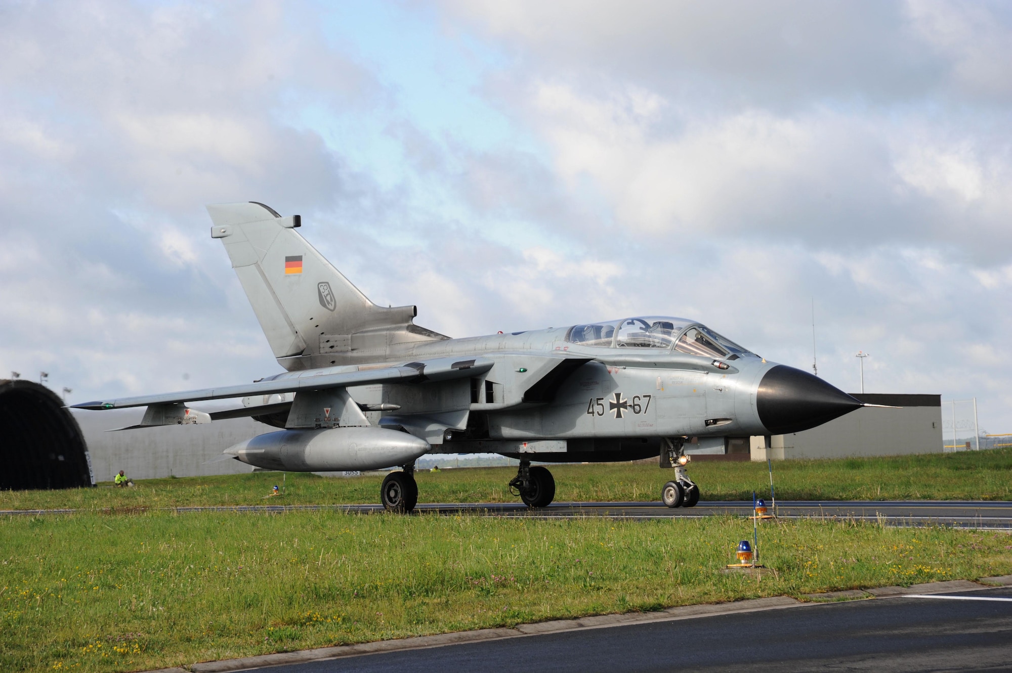A German air force PA-200 Tornado multirole combat aircraft pilot taxies after landing May 7, 2014, at Spangdahlem Air Base, Germany.  The tornado landed here for an Electro Magentic Interference test on the aircraft. (U.S. Air Force photo by Airman 1st Class Dylan Nuckolls/Released)