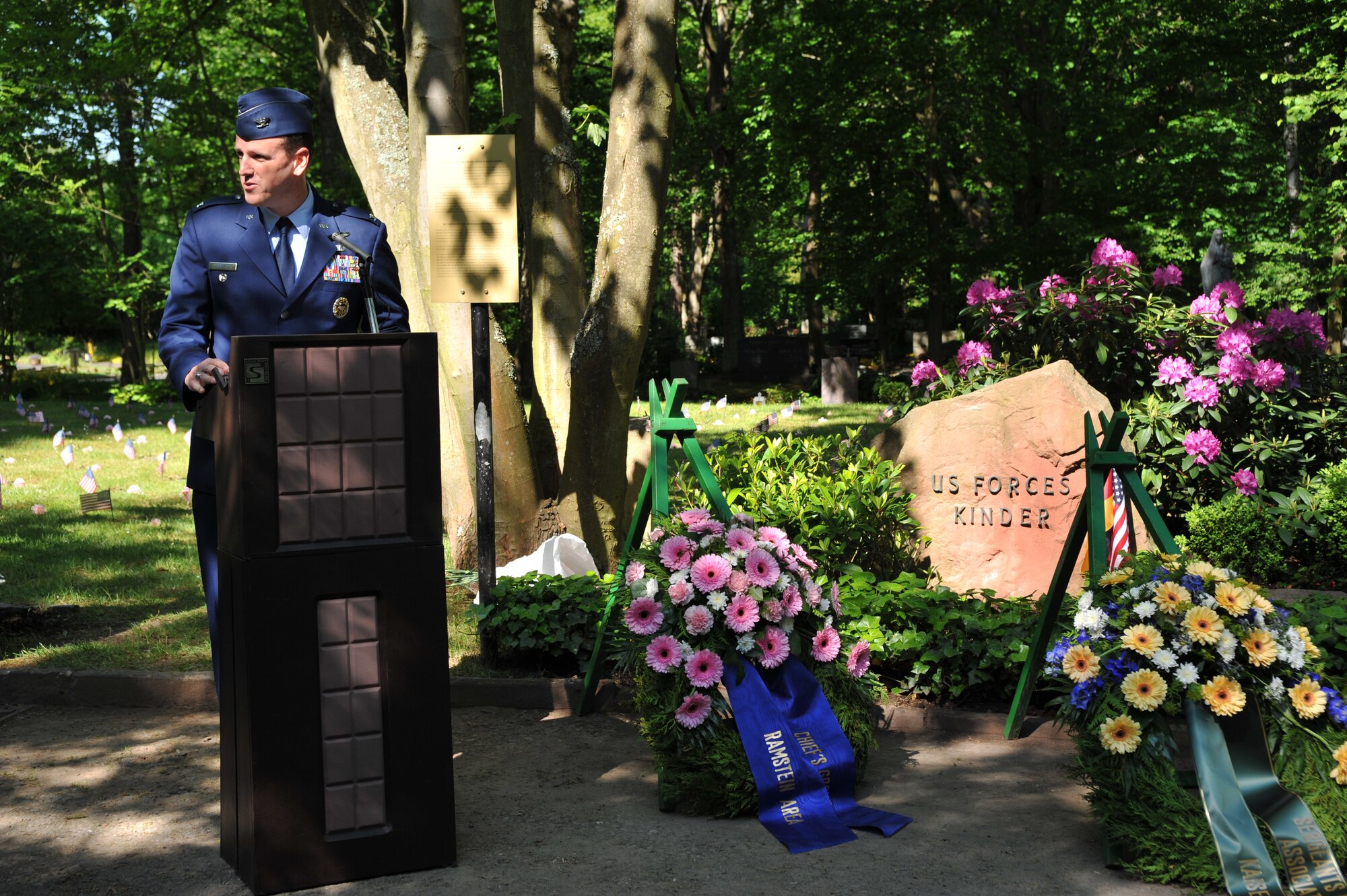 Col. Leslie T. Smith, 86th Airlift Wing vice commander, says a few words during the Kindergrave’s ceremony at the Kaiserslautern cemetery, Germany, May 17, 2014. This ceremony is held every year the Saturday after Mother’s Day to keep the children’s memories alive. (U.S. Air Force photo/Senior Airman Hailey Haux)