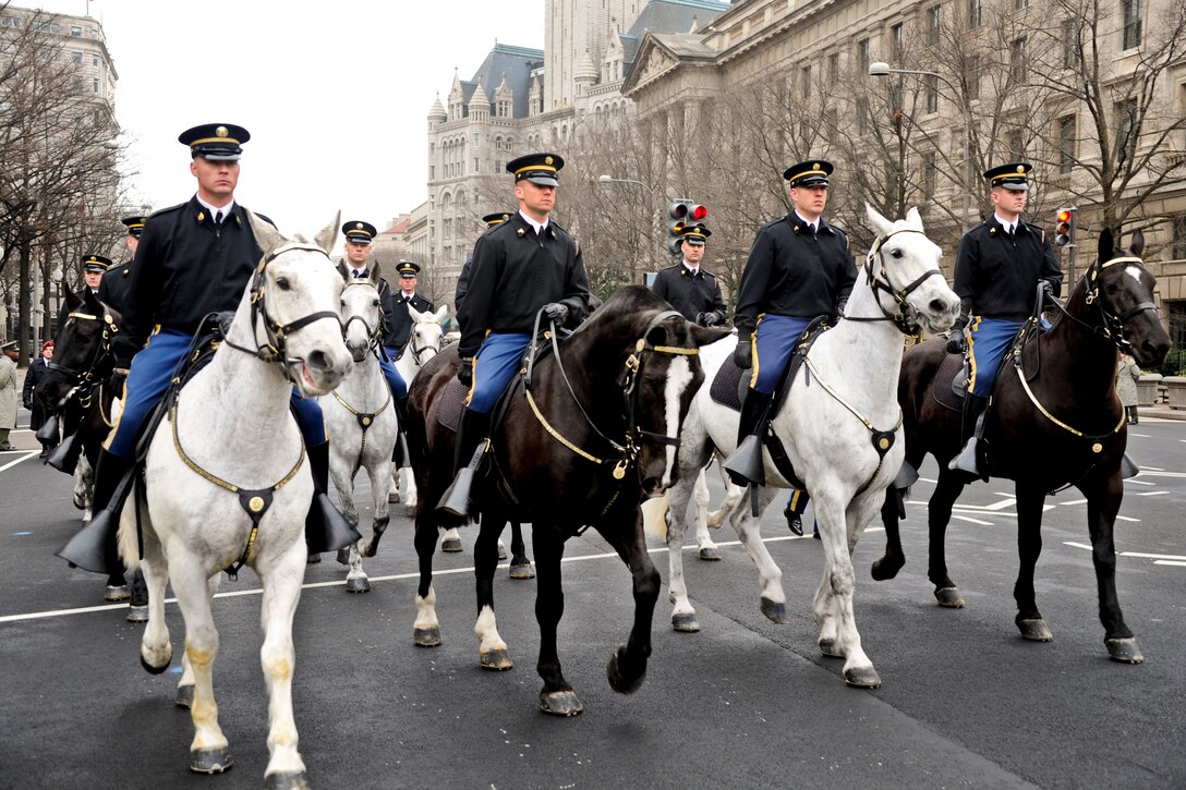 Members of the caisson platoon of the 3rd U.S. Infantry Regiment, known as "The Old Guard," march down Pennsylvania Avenue in Washington, D.C., Jan. 13, 2013, during a dress rehearsal for the Inauguration Day parade Jan. 21.  
