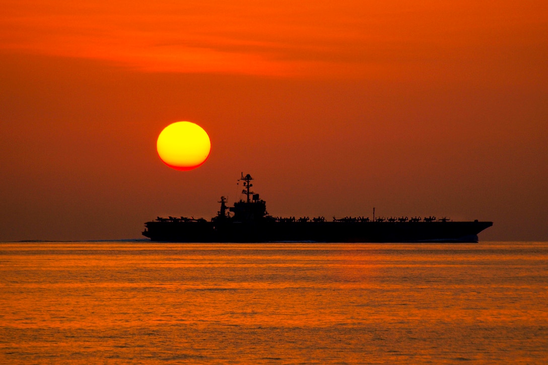 The aircraft carrier the USS John C. Stennis operates during sunset in the Arabian Sea in the U.S. 5th Fleet area of responsibility, Jan. 5, 2012 The Stennis is conducting maritime security operations, theater security cooperation efforts and support missions for Operation Enduring Freedom.  
