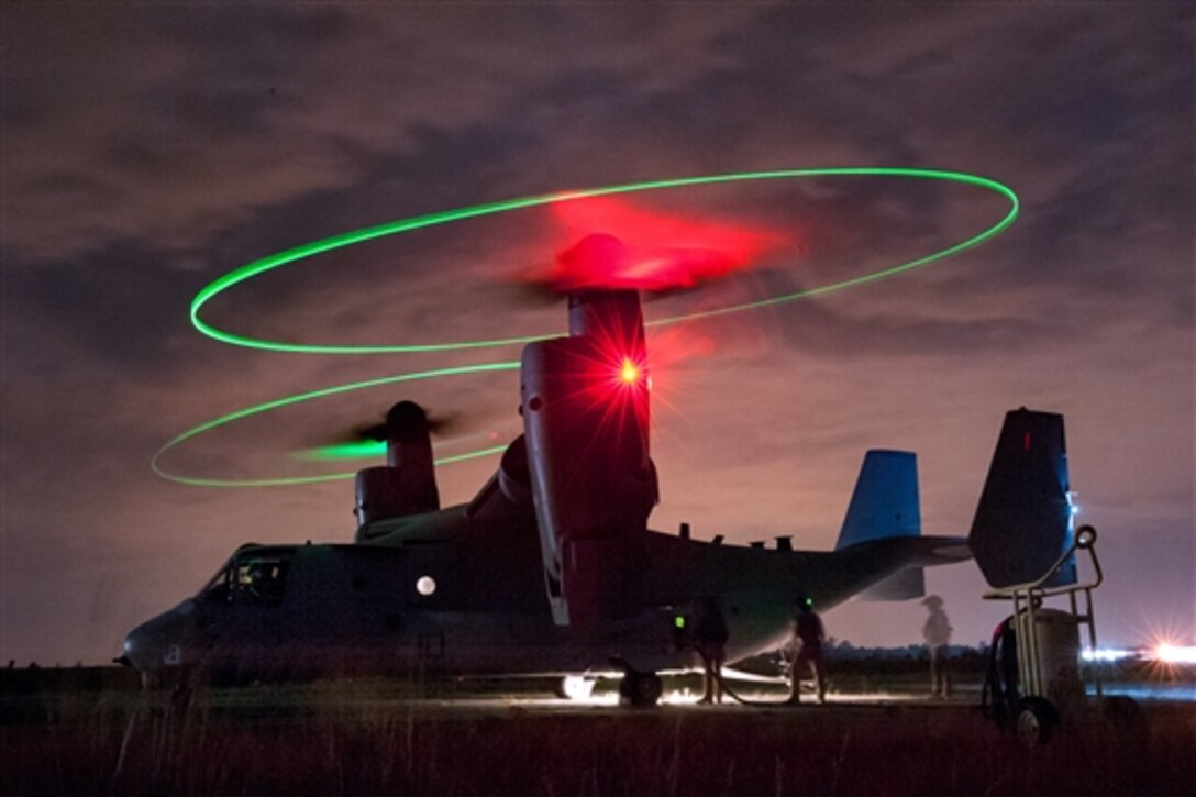 Marines fuel an MV-22 Osprey at a forward air refueling point on McEntire Joint National Guard Base, S.C., May 14, 2014. The Marines, assigned to 273rd Marine Wing Support Squadron, Air Operations Company, conducted the joint operations with the South Carolina Air and Army National Guard. The missions are crucial to the ongoing success of operational readiness and deployments around the world. 
