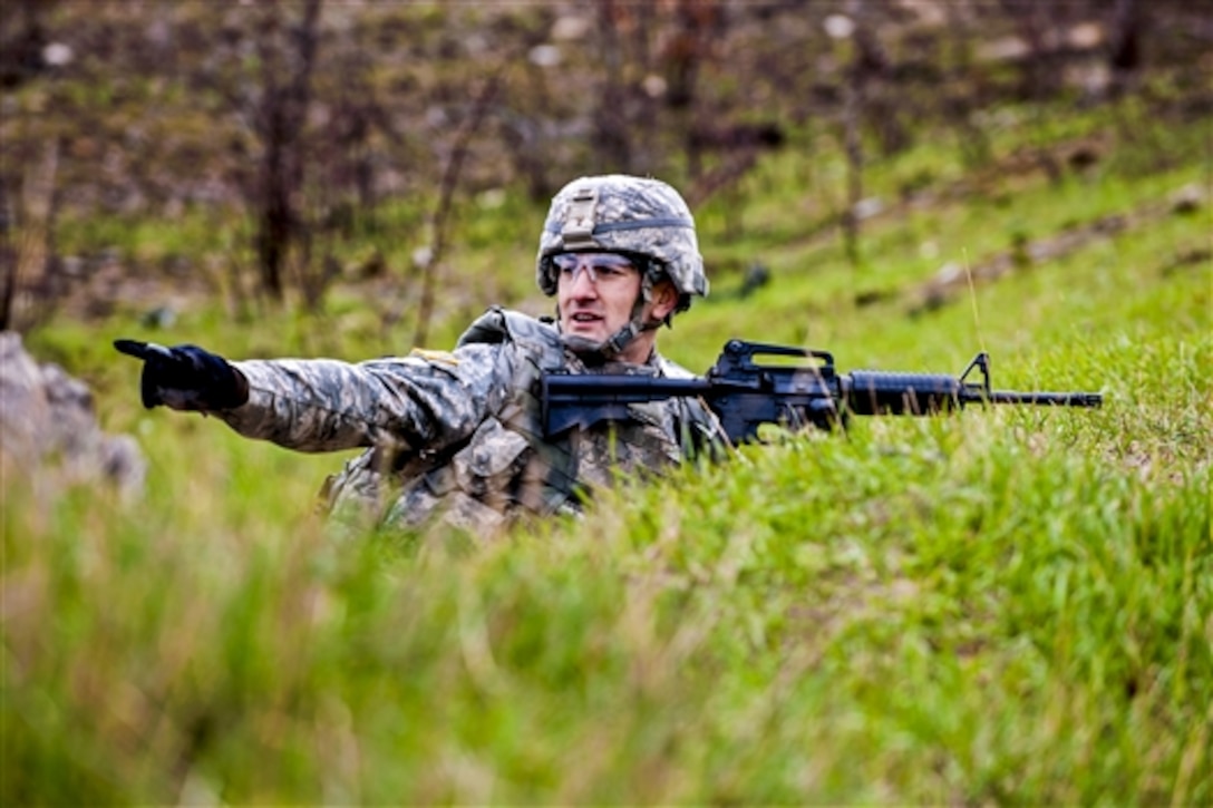 Army Sgt. Andrew Sireno provides security during the offensive maneuver event during Sapper Stakes on Fort McCoy, Wis., May 5, 2014. Sireno is a combat engineer assigned to the 469th Engineer Company. The annual competition test the operations skills of combat engineers through evaluated field exercises.  
