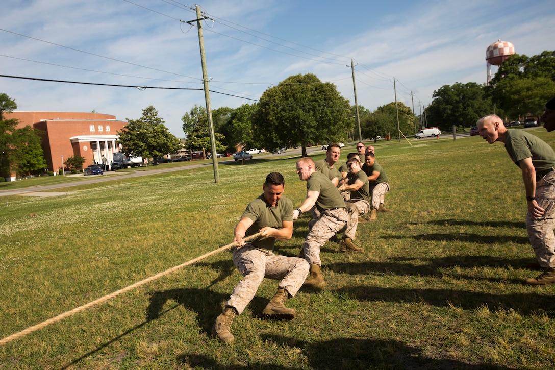 Marines pull during the tug-of-war at a field meet held by Headquarters Support Battalion for the units monthly Commander’s Cup Challenge, aboard Marine Corps Base Camp Lejeune, May 15.  Alpha Company won the tug-of-war and took second place for the challenge with 20 points. Security Company won overall with 45 points while Bravo and India Company were disqualified.