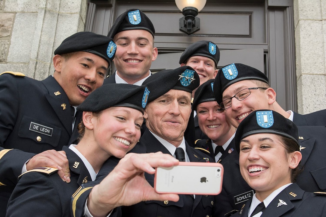 Newly commissioned second lieutenants, formerly cadets in the University of Rhode Island’s Army ROTC battalion, take a selfie with DIA Director Lt. Gen. Michael Flynn after a commissioning ceremony May 16.