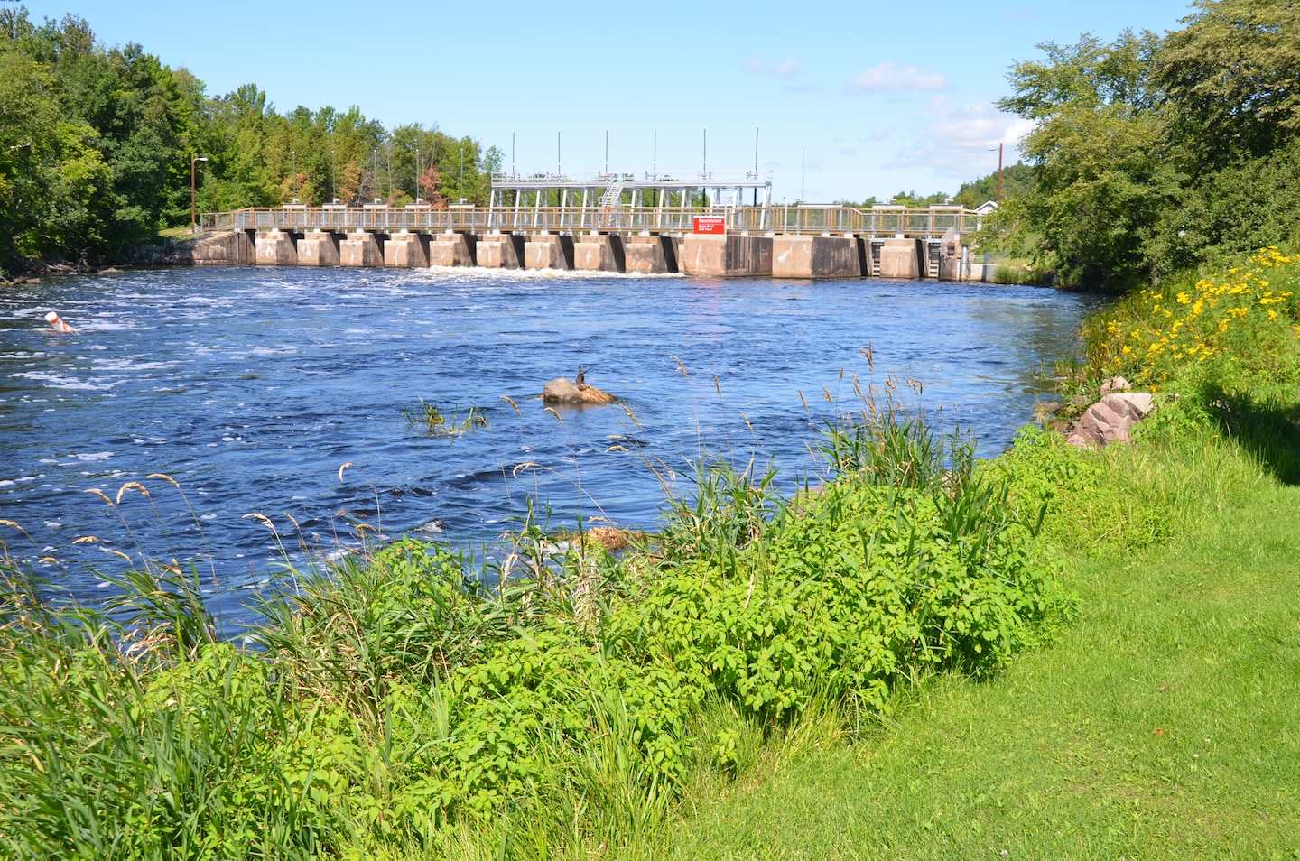 The Pokegama Recreation Area is situated on the Mississippi River at the western edge of Grand Rapids, Minn. Festivals and events held throughout the summer in nearby Grand Rapid make our campsites very convenient for area visitors and travelers on U.S. Highway 2. 
  The recreation area offers camping, boating, picnicking, fishing and playground areas. There are 19 camp sites and two tent sites. The camp and tents site adjacent to the Mississippi River gives campers a spectacular view of the river. The picnic area is located near the parking area and close enough to the river for breezy winds on a hot day. 
  Pokegama Lake is a highly utilized lake for recreational purposes, such as fishing, boating, waterskiing and personal watercraft use. A boat ramp just north of the dam gives boaters access to the river. The fish population includes walleye, northern pike, smallmouth bass, largemouth bass, pan fish and the occasional lake trout. USACE photo by Patrick Moes
