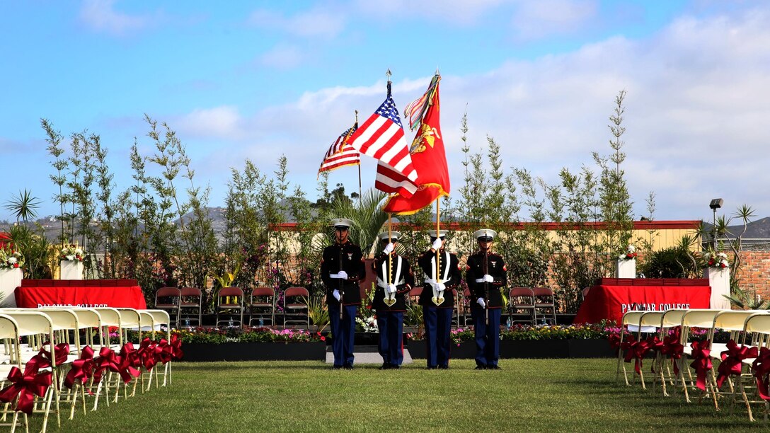 Corporal Justin G. Rush, right center, embarkation specialist, 15th Marine Expeditionary Unit, practices with the color guard before presenting the Colors during a commencement ceremony at Palomar College campus in San Marcos, Calif., May 20, 2014. Rush, 20, is from Tacoma, Wash. (U.S. Marine Corps photo by Cpl. Emmanuel Ramos/Released)