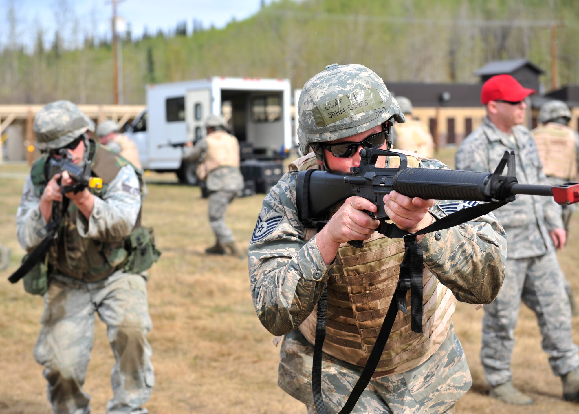 Tech. Sgt. John Gines, 354th Civil Engineer Squadron range maintenance NCO in charge, practices movement training with an M-16A2 rifle May 15, 2014, Eielson Air Force Base, Alaska. Members from the 354th CES were taught to move quickly and quietly to avoid giving away their location to opposing forces. (U.S. Air Force photo by Senior Airman Ashley Nicole Taylor/Released)