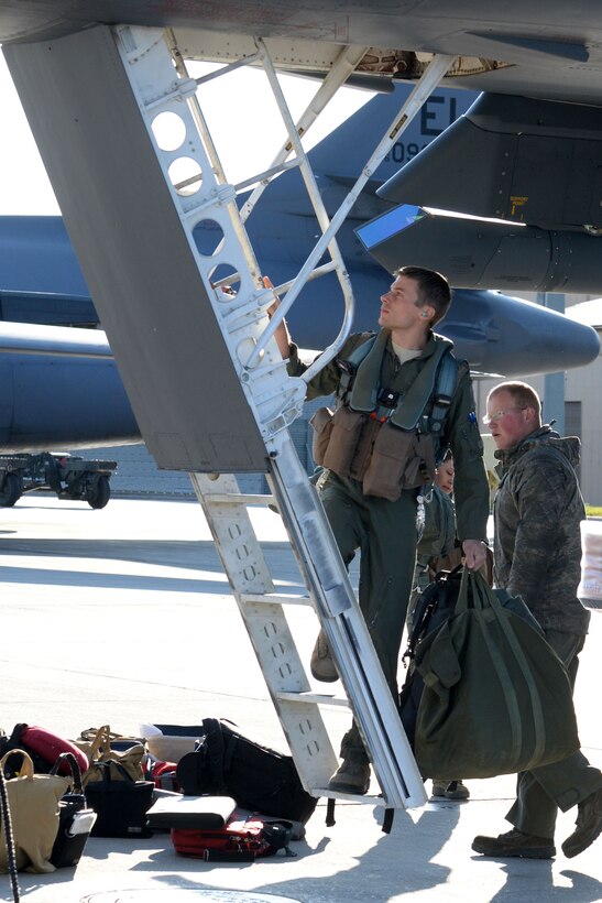 Capt. Andrew Bergman, 34th Bomb Squadron copilot, boards a B-1B Lancer for a Global Power Mission at Ellsworth Air Force Base, S.D., May 12, 2014. The long range training flight validated the U.S. Air Force's ability to maintain a high state of readiness and demonstrated the capability of a bomber force that is flexible, credible and always ready to respond to a variety of threats and situations around the world. (U.S. Air Force photo by Airman 1st Class Rebecca Imwalle/Released)