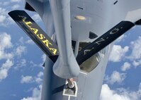 A B-1B Lancer from the 34th Bomb Squadron, Ellsworth Air Force Base, S.D., receives fuel from a KC-135 Stratotanker from the 168th Air Refueling Wing, Alaska Air National Guard, Eielson Air Force Base, Alaska, over the Pacific Ocean May 14, 2014. The flight was in support of a mission in which two B-1 bombers from Ellsworth flew round trip, non-stop to training ranges near Guam, demonstrating the nation’s capability to provide a flexible and always ready force to respond to a variety of threats and situations.  (U.S. Air Force photo by Senior Airman Katrina M. Brisbin/Released)