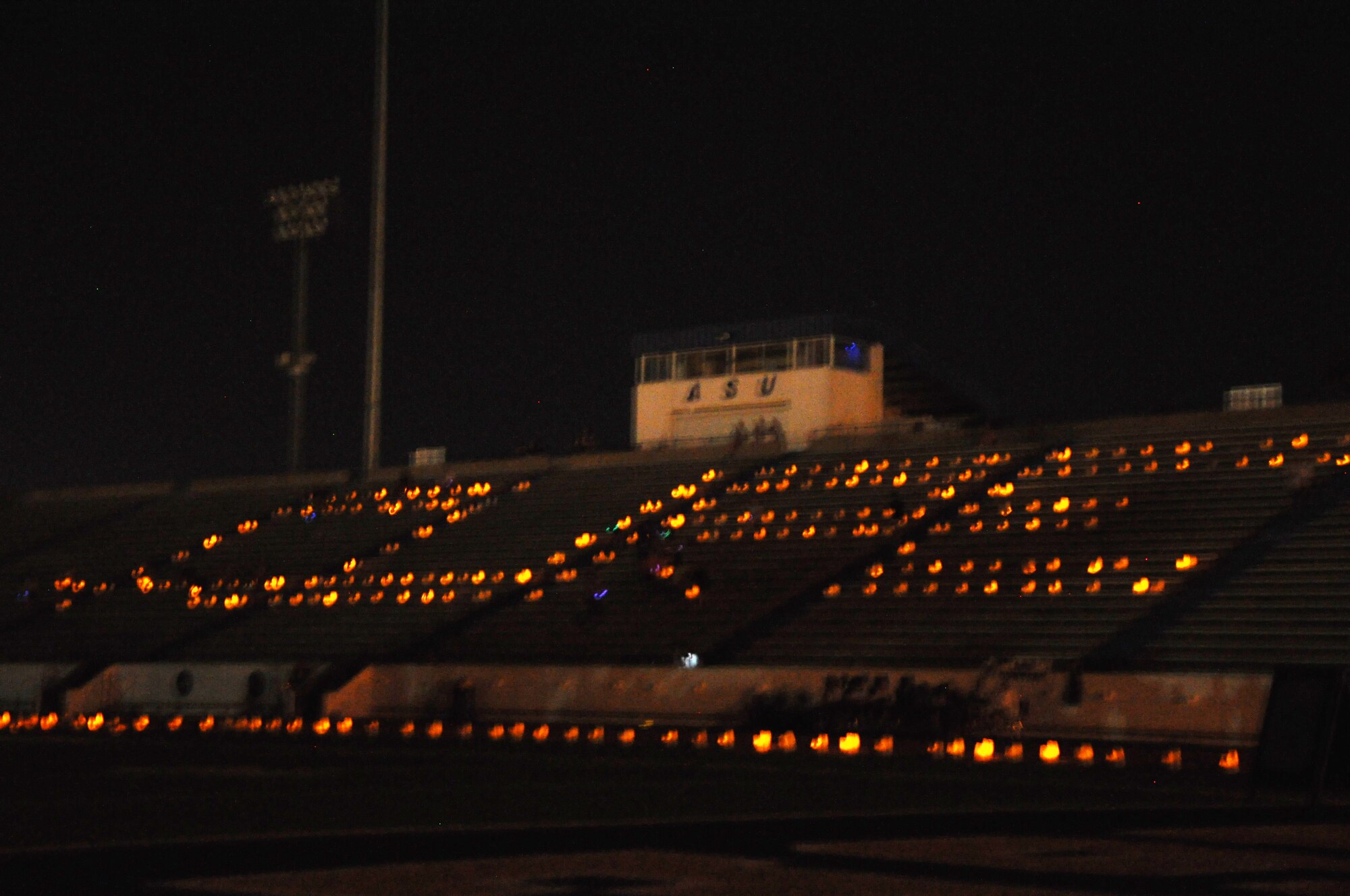 SAN ANGELO, Texas – The word cure is spelled out in candle-lit bags during the Luminaria Ceremony for the Relay for Life at the LeGrand Sports Complex here May 16. The Luminaria Ceremony is held every year to honor loved ones who have passed away or are still fighting cancer. (U.S. Air Force photo/ Senior Airman Joshua Edwards)