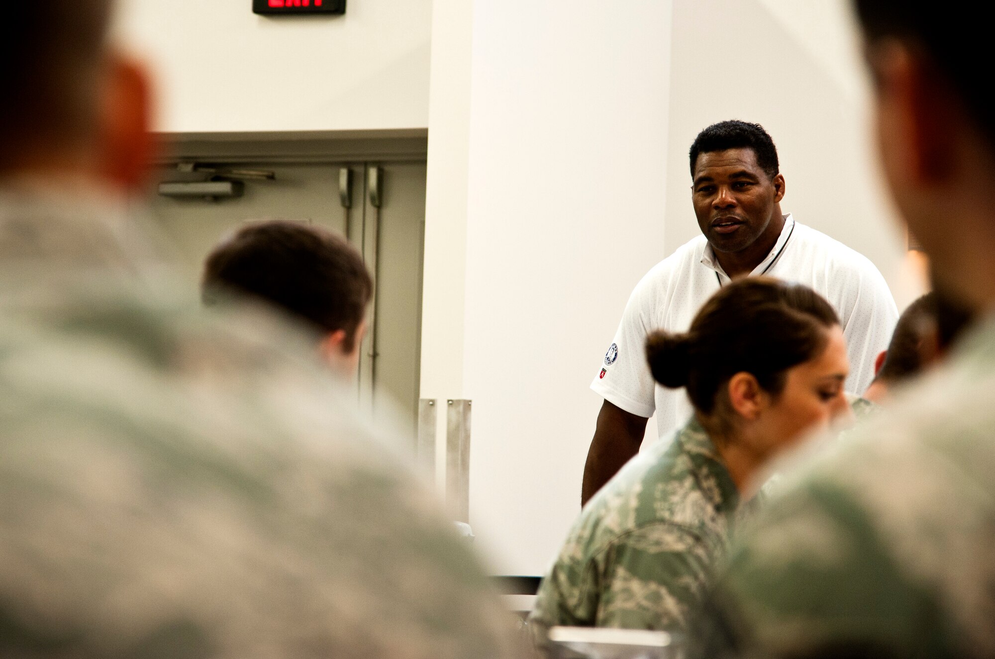 Herschel Walker responds to a question about his football career during a breakfast May 21, 2014, at Whiteman Air Force Base, Missouri. Walker is a three-time All-American and winner of the 1982 Heisman Trophy. (U.S. Air Force photo by Senior Airman Daniel Phelps/Released)