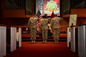 U.S. Army Soldiers render a final salute to fallen Transportation Corps Soldiers during a Memorial Wall Rededication Ceremony at Fort Eustis, Va., May 21, 2014.  The Memorial Wall is located in the Transportation Corps  Regimental Chapel at Fort Eustis, and is inscribed with 1,972 names of Army transporters who gave their lives in the defense of freedom in conflicts ranging from the Vietnam War to Operations Iraqi and Enduring Freedom.  (U.S. Air Force photo by Staff Sgt. Katie Gar Ward/Released)